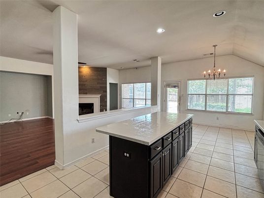 Chandelier, Fireplace, Interior, Kitchen, Pendant Lights, Recessed Lighting, Wood Texture Flooring