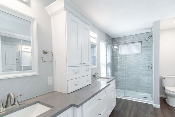 Bathroom, Dual Sink Vanities, Glass Shower, Interior, Recessed Lighting, Wood Texture Flooring