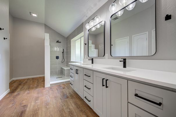 Bathroom, Dual Sink Vanities, Glass Shower, Interior, Recessed Lighting, Wood Texture Flooring