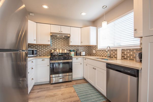 Interior, Kitchen, Pendant Lights, Recessed Lighting, Stainless Steel Appliances, Wood Texture Flooring
