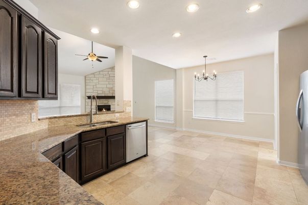Chandelier, Fireplace, Interior, Kitchen, Recessed Lighting, Stone Walls