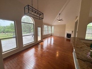 Chandelier, Empty room, Fireplace, Interior, Pendant Lights, Wood Texture Flooring