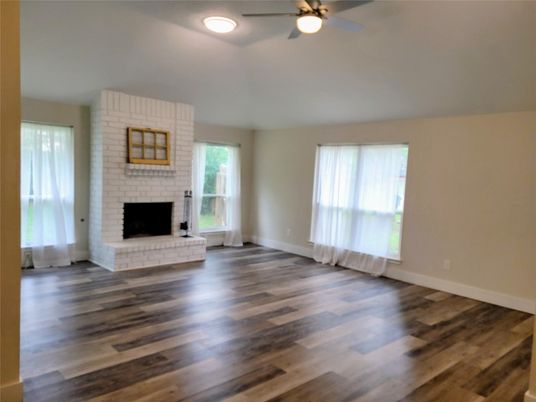 Empty room, Fireplace, Interior, Recessed Lighting, Stone Walls, Wood Texture Flooring