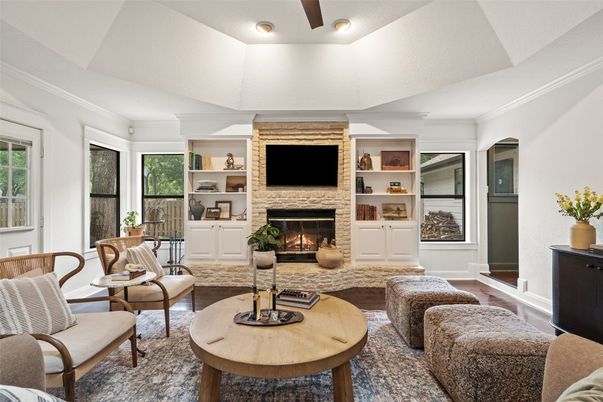 Fireplace, Interior, Living room, Recessed Lighting, Stone Walls, Wood Texture Flooring