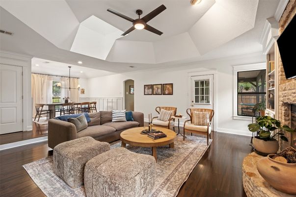 Dining room, Fireplace, Interior, Living room, Pendant Lights, Recessed Lighting, Wood Texture Flooring