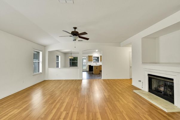 Empty room, Fireplace, Interior, Kitchen, Pendant Lights, Wood Texture Flooring