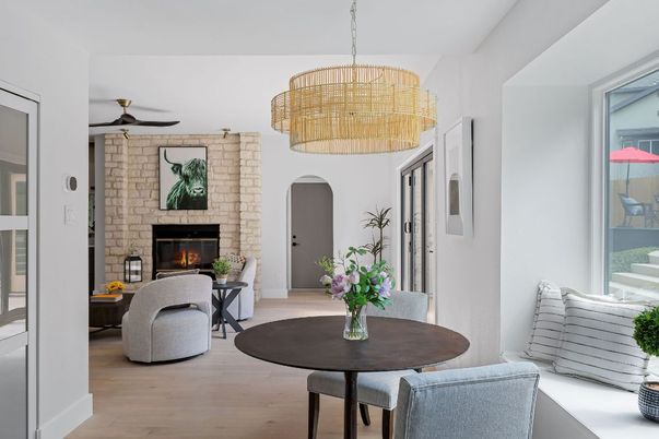 Chandelier, Dining room, Fireplace, Interior, Living room, Pendant Lights, Stone Walls, Wood Texture Flooring