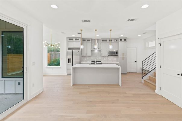 Interior, Kitchen, Pendant Lights, Recessed Lighting, Stainless Steel Appliances, Wood Texture Flooring
