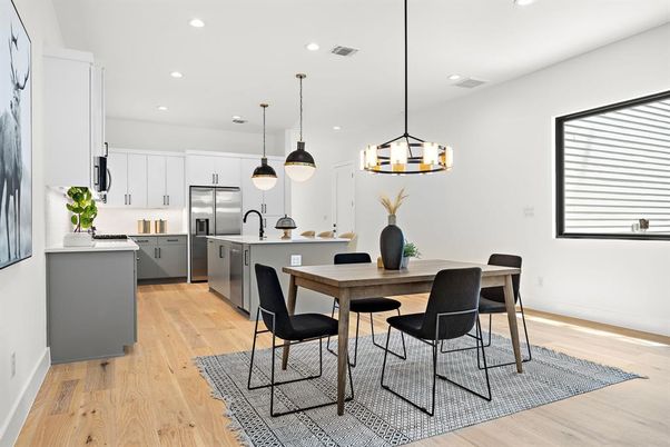 Dining room, Interior, Kitchen, Pendant Lights, Recessed Lighting, Stainless Steel Appliances, Wood Texture Flooring