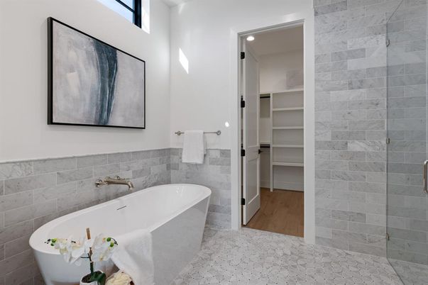 Bathroom, Free Standing Baths, Glass Shower, Interior, Recessed Lighting, Walk-in Closets, Wood Texture Flooring