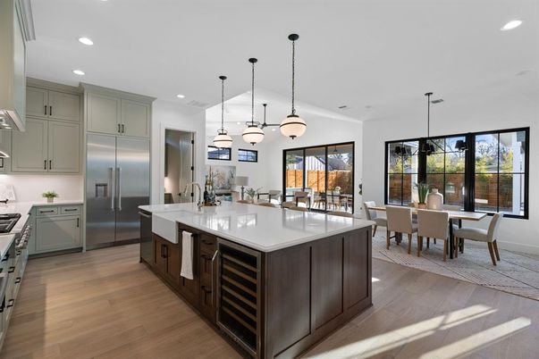 Dining room, Interior, Kitchen, Pendant Lights, Recessed Lighting, Stainless Steel Appliances, Wood Texture Flooring
