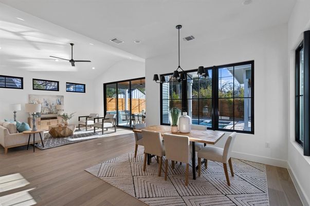 Dining room, Fireplace, Interior, Living room, Pendant Lights, Recessed Lighting, Wood Texture Flooring