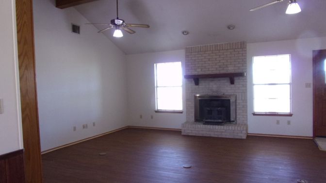 Empty room, Fireplace, Interior, Stone Walls, Wooden Beams, Wood Texture Flooring