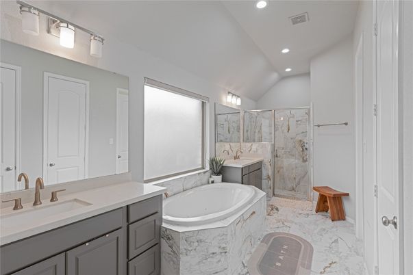 Bathroom, Dual Sink Vanities, Glass Shower, Interior, Marble, Marble Walls, Recessed Lighting