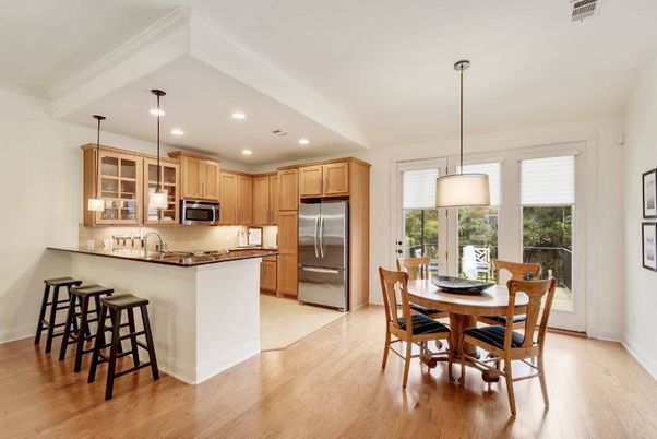 Dining room, Interior, Kitchen, Pendant Lights, Recessed Lighting, Stainless Steel Appliances, Wood Texture Flooring