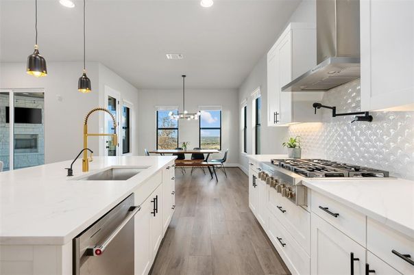 Dining room, Interior, Kitchen, Pendant Lights, Recessed Lighting, Stainless Steel Appliances, Water, Wood Texture Flooring