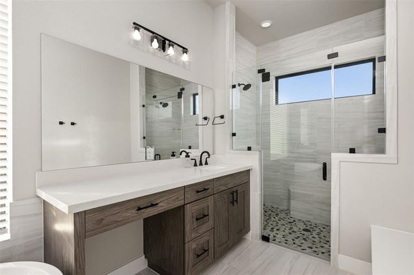 Bathroom, Dual Sink Vanities, Glass Shower, Interior, Recessed Lighting, Wood Texture Flooring