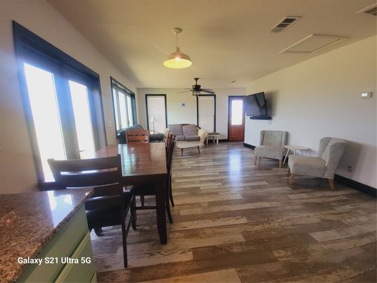 Dining room, Interior, Living room, Pendant Lights, Wood Texture Flooring