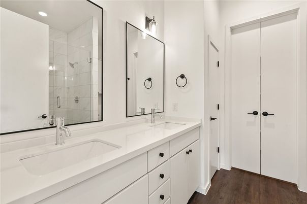 Bathroom, Dual Sink Vanities, Glass Shower, Interior, Recessed Lighting, Wood Texture Flooring