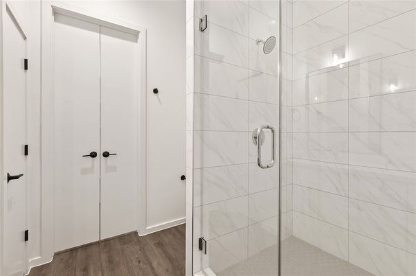 Bathroom, Glass Shower, Interior, Marble Walls, Wood Texture Flooring