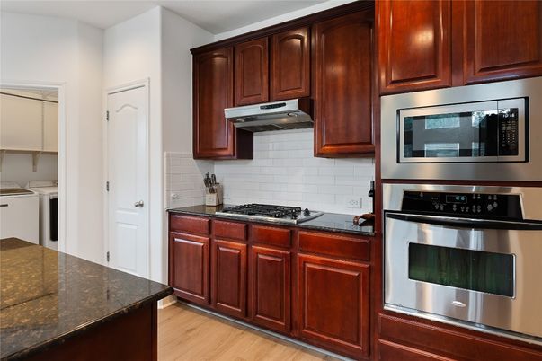 Interior, Kitchen, Stainless Steel Appliances, Washer, Wood Texture Flooring