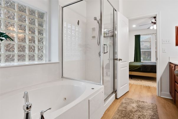 Bathroom, Bedroom, Glass Shower, Interior, Recessed Lighting, Wood Texture Flooring