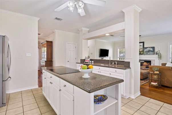 Fireplace, Interior, Kitchen, Living room, Recessed Lighting, Wood Texture Flooring