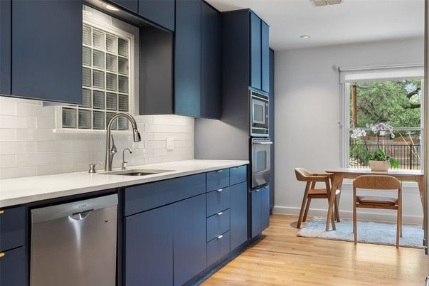 Dining room, Interior, Kitchen, Recessed Lighting, Stainless Steel Appliances, Wood Texture Flooring
