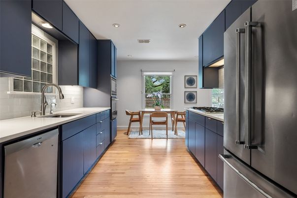 Dining room, Interior, Kitchen, Recessed Lighting, Stainless Steel Appliances, Wood Texture Flooring