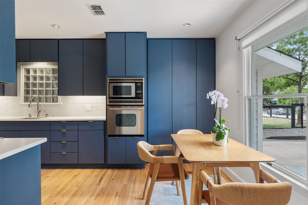 Dining room, Interior, Kitchen, Recessed Lighting, Stainless Steel Appliances, Wood Texture Flooring