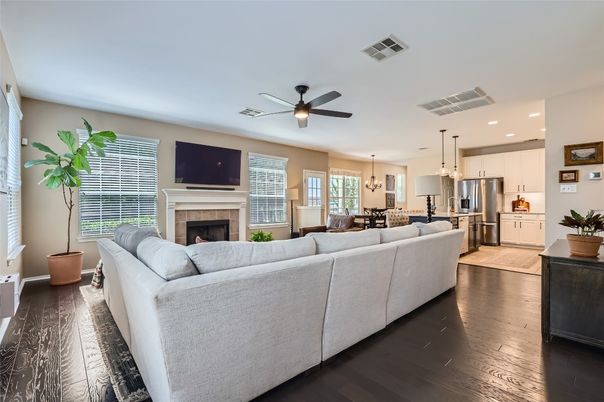 Dining room, Fireplace, Interior, Kitchen, Living room, Pendant Lights, Recessed Lighting, Stainless Steel Appliances, Wood Texture Flooring
