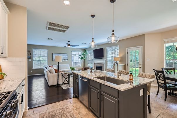 Dining room, Fireplace, Interior, Kitchen, Living room, Pendant Lights, Recessed Lighting, Stainless Steel Appliances