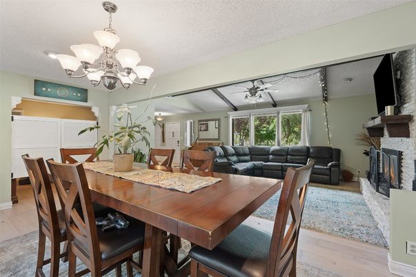 Chandelier, Dining room, Fireplace, Interior, Living room, Wood Texture Flooring