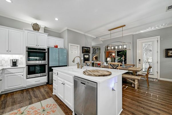 Dining room, Interior, Kitchen, Pendant Lights, Recessed Lighting, Stainless Steel Appliances, Wood Texture Flooring