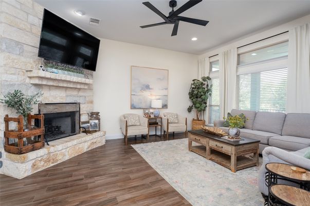 Fireplace, Interior, Living room, Recessed Lighting, Stone Walls, Wood Texture Flooring
