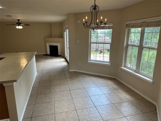 Chandelier, Empty room, Fireplace, Interior