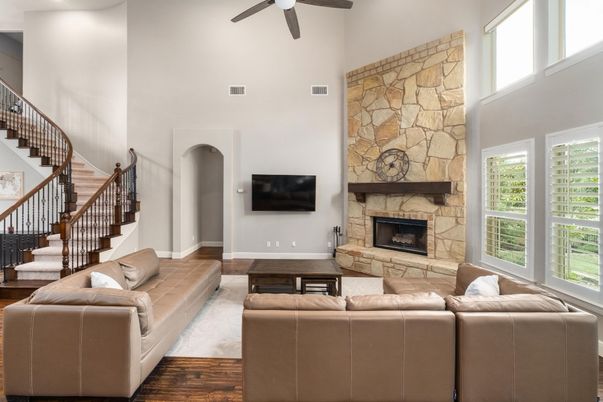 Fireplace, Interior, Living room, Recessed Lighting, Stone Walls, Wood Texture Flooring