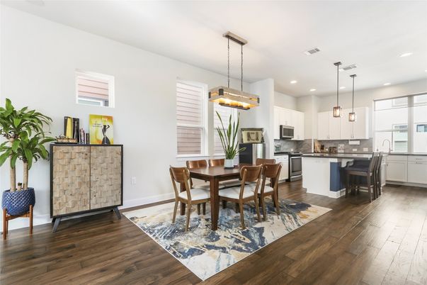 Dining room, Interior, Kitchen, Pendant Lights, Recessed Lighting, Stainless Steel Appliances, Wood Texture Flooring