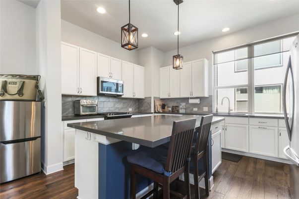 Interior, Kitchen, Pendant Lights, Recessed Lighting, Stainless Steel Appliances, Wood Texture Flooring