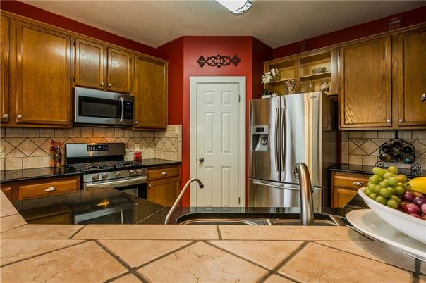 Interior, Kitchen, Stainless Steel Appliances, Tile Countertops