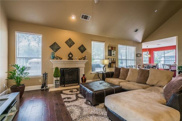 Dining room, Fireplace, Interior, Living room, Pendant Lights, Recessed Lighting, Wood Texture Flooring