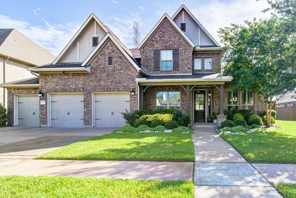 Attached, Exterior, Facade, Brick Facade, Brick Traditional