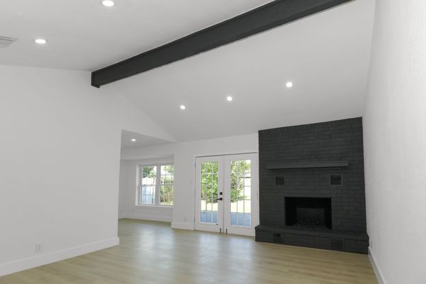 Empty room, Fireplace, Interior, Recessed Lighting, Wooden Beams, Wood Texture Flooring