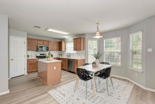 Dining room, Interior, Kitchen, Pendant Lights, Stainless Steel Appliances, Wood Texture Flooring