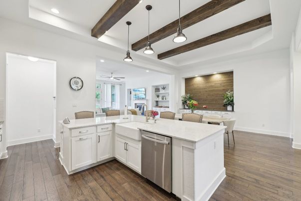 Dining room, Interior, Kitchen, Living room, Pendant Lights, Recessed Lighting, Stainless Steel Appliances, Wooden Beams, Wood Texture Flooring