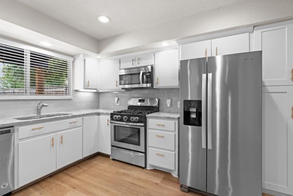 Interior, Kitchen, Recessed Lighting, Stainless Steel Appliances, Wood Texture Flooring