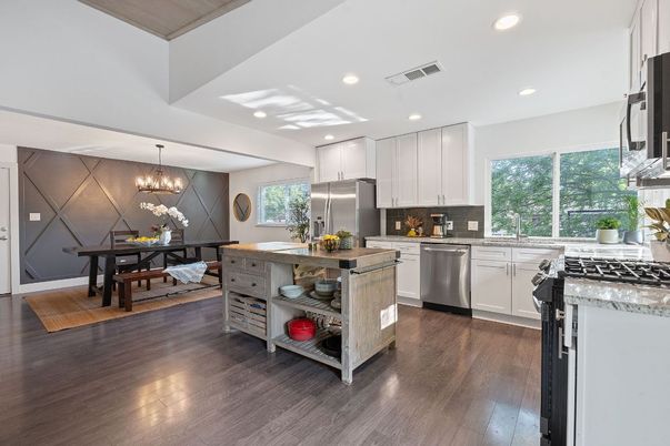 Chandelier, Dining room, Interior, Kitchen, Recessed Lighting, Stainless Steel Appliances, Wood Texture Flooring