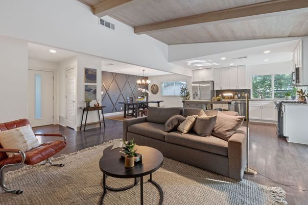 Chandelier, Dining room, Interior, Kitchen, Living room, Pendant Lights, Recessed Lighting, Stainless Steel Appliances, Wooden Beams, Wooden Ceilings, Wood Texture Flooring