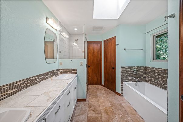 Bathroom, Dual Sink Vanities, Interior, Recessed Lighting, Tile Countertops