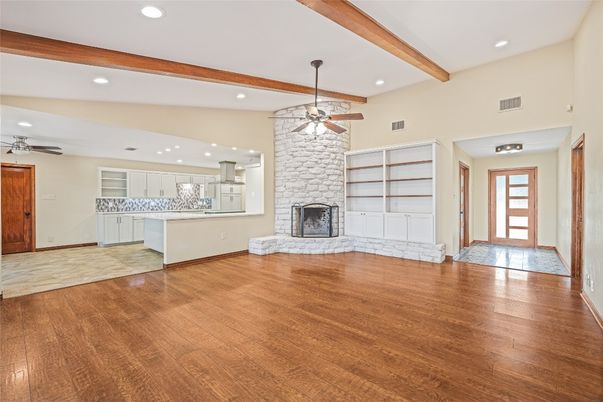 Empty room, Fireplace, Interior, Kitchen, Recessed Lighting, Wooden Beams, Wood Texture Flooring